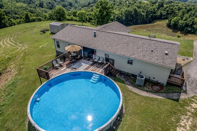 494 Janice Ln, Owingsville, KY 40360 - view of pool with a wooden deck, a lawn, and a view of trees