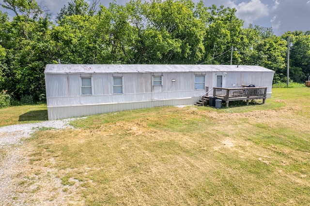 494 Janice Ln, Owingsville, KY 40360 - manufactured / mobile home featuring a front yard and a deck