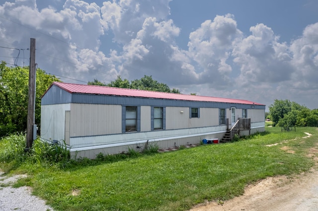 494 Janice Ln, Owingsville, KY 40360 - manufactured / mobile home featuring a front lawn and a metal roof