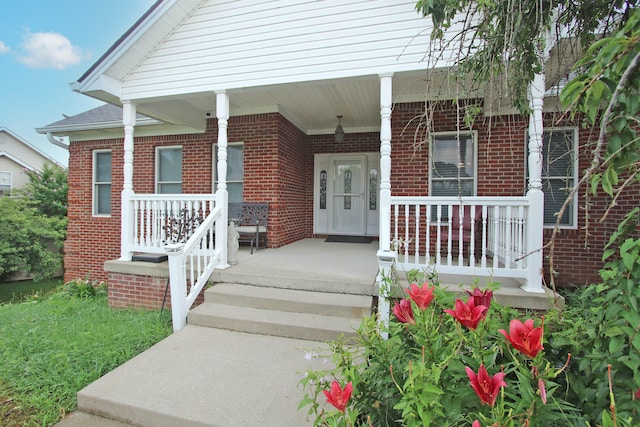 1016 Cedar Ridge Ln, Versailles, KY 40383 - property entrance featuring a porch and brick siding