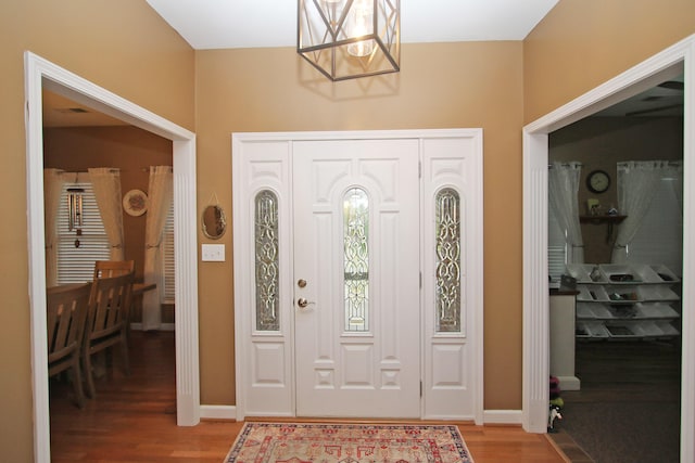 1016 Cedar Ridge Ln, Versailles, KY 40383 - entryway with light wood finished floors and a chandelier