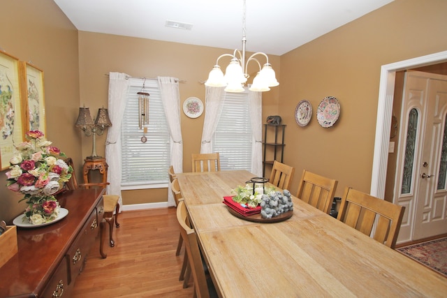 1016 Cedar Ridge Ln, Versailles, KY 40383 - dining space featuring a chandelier and light wood-style flooring