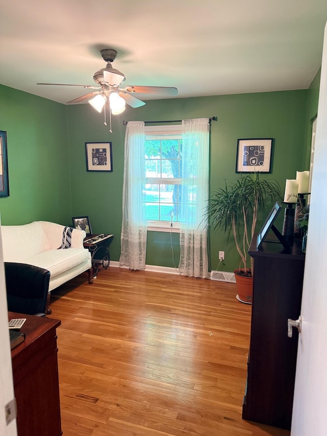 1310 Lago Dr, Frankfort, KY 40601 - living room with a ceiling fan and wood finished floors