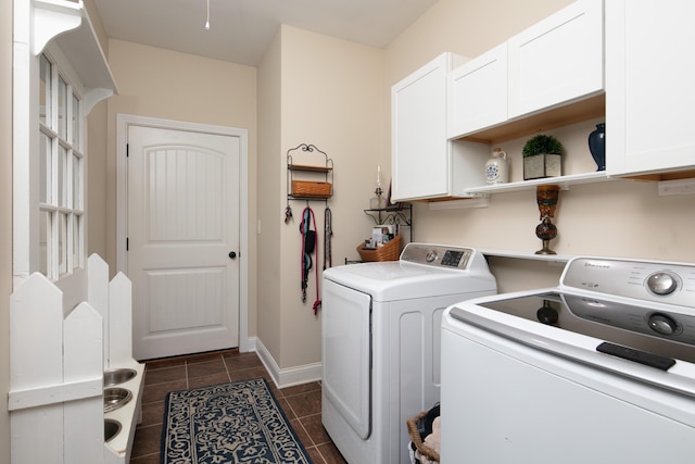 136 Rocky Creek Rd, Georgetown, KY 40324 - washroom featuring cabinet space, washer and clothes dryer, and dark tile patterned flooring