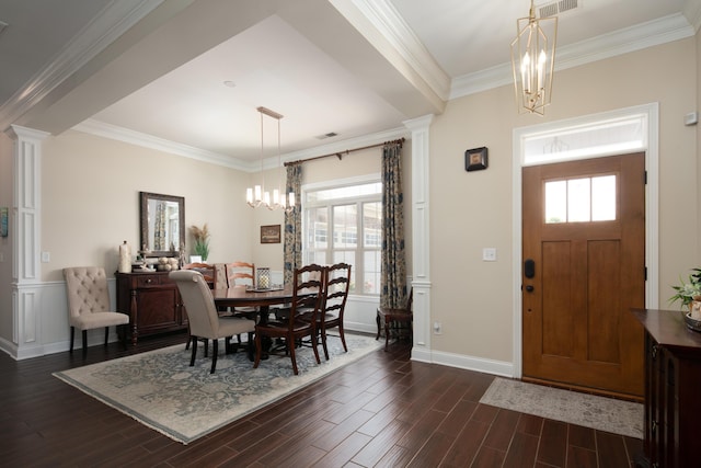 136 Rocky Creek Rd, Georgetown, KY 40324 - dining area featuring a chandelier, dark wood finished floors, ornamental molding, and decorative columns