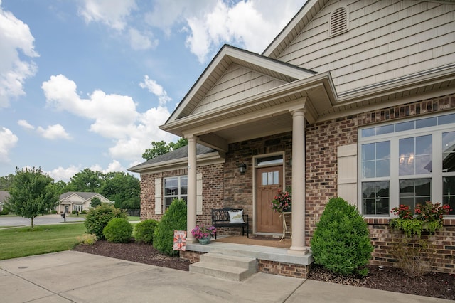 136 Rocky Creek Rd, Georgetown, KY 40324 - doorway to property with brick siding and covered porch
