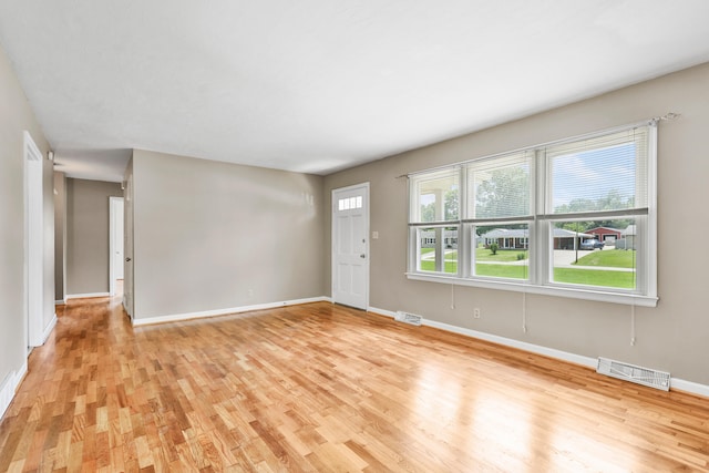 227 Gailane St, Lawrenceburg, KY 40342 - unfurnished living room with light wood-style flooring and baseboards