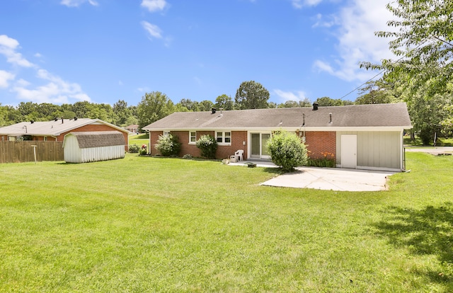 227 Gailane St, Lawrenceburg, KY 40342 - rear view of property with a patio area, a shed, and brick siding
