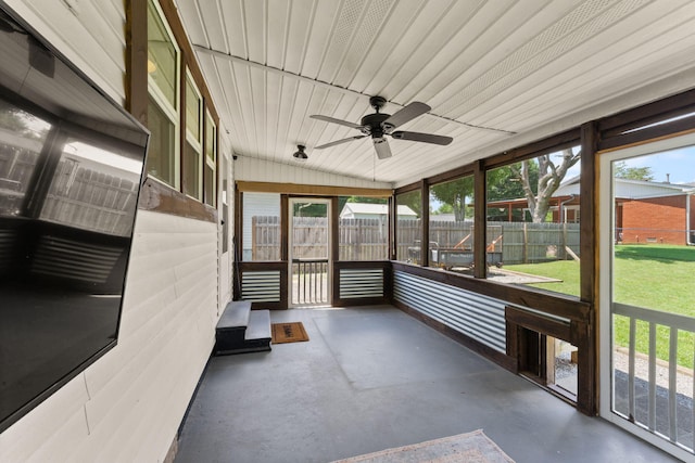 411 E Washington St, Franklin, KY 42134 - unfurnished sunroom with vaulted ceiling, a ceiling fan, and plenty of natural light