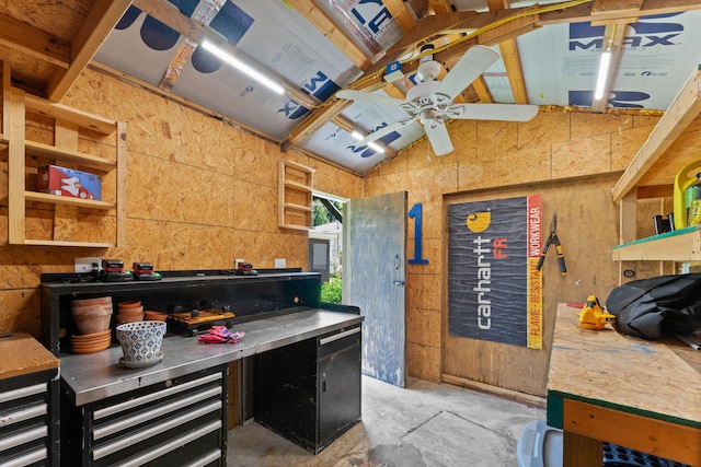 411 E Washington St, Franklin, KY 42134 - kitchen featuring vaulted ceiling, open shelves, and unfinished concrete floors