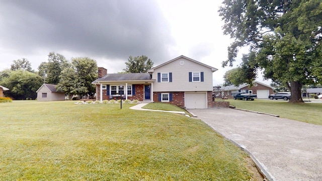 1010 Riverside Dr, Harrodsburg, KY 40330 - tri-level home with brick siding, driveway, a chimney, a garage, and a front lawn