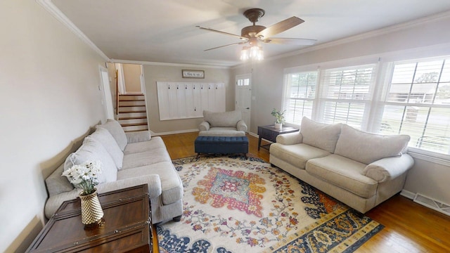 1010 Riverside Dr, Harrodsburg, KY 40330 - living area featuring a ceiling fan, wood finished floors, crown molding, and stairway