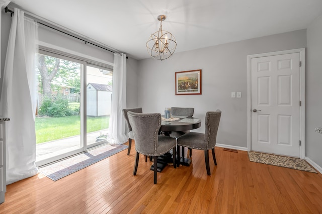2864 Ark Royal Way, Lexington, KY 40503 - dining room featuring a chandelier and light wood-type flooring
