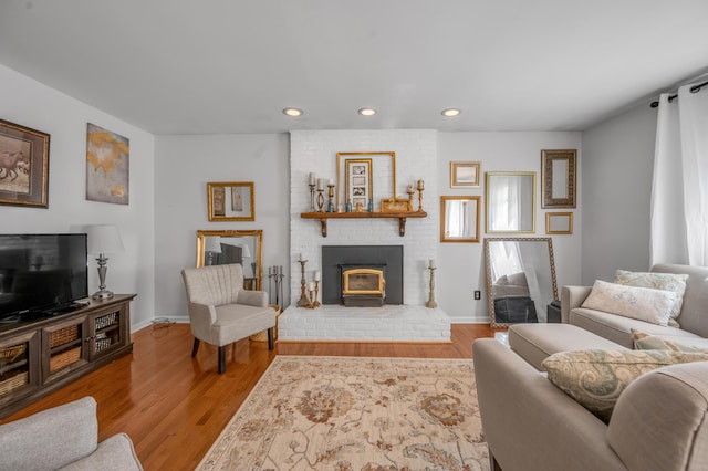 2864 Ark Royal Way, Lexington, KY 40503 - living area with wood finished floors, recessed lighting, and a brick fireplace