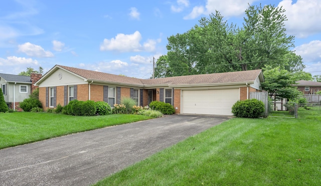 2864 Ark Royal Way, Lexington, KY 40503 - single story home featuring brick siding, an attached garage, and asphalt driveway