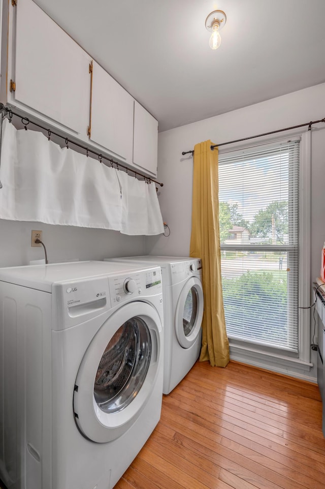 2864 Ark Royal Way, Lexington, KY 40503 - laundry area with washing machine and clothes dryer and light wood-style flooring
