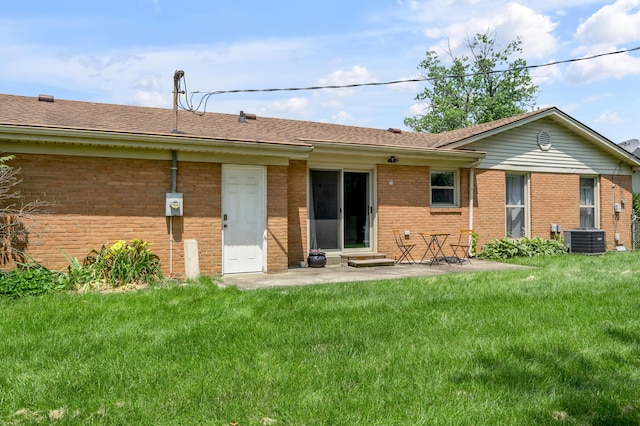 2864 Ark Royal Way, Lexington, KY 40503 - back of house with brick siding, a yard, and a patio area