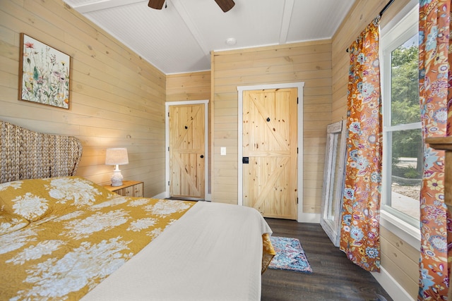 813 Colyer Rd, Bronston, KY 42518 - bedroom featuring wood walls, dark wood-type flooring, and a ceiling fan