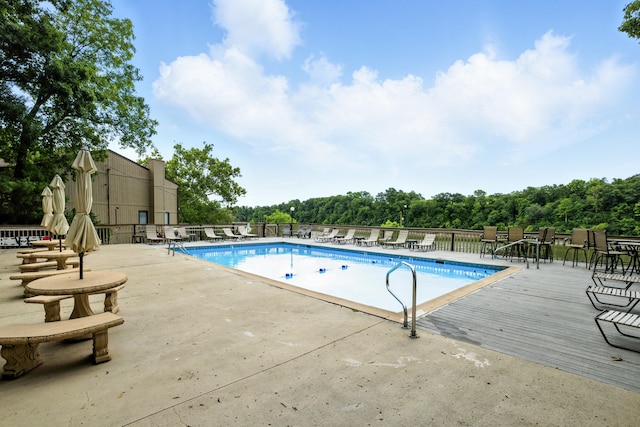 1011 Hancock Cir Unit 9-10, Harrodsburg, KY 40330 - community pool with view of scattered trees and a patio