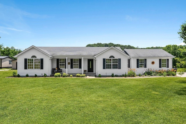 997 Copper Creek Rd, Berea, KY 40403 - ranch-style home featuring covered porch, a front lawn, and a shingled roof
