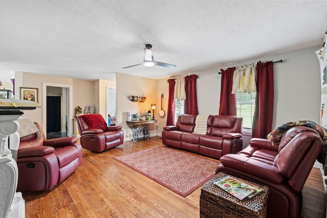997 Copper Creek Rd, Berea, KY 40403 - living area with wood finished floors, a textured ceiling, and ceiling fan