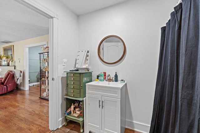 997 Copper Creek Rd, Berea, KY 40403 - full bath with vanity and wood finished floors