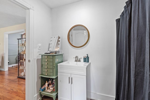 997 Copper Creek Rd, Berea, KY 40403 - bathroom featuring wood finished floors and vanity
