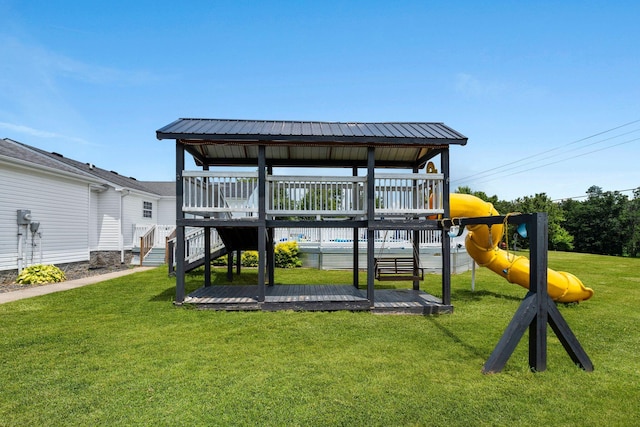 997 Copper Creek Rd, Berea, KY 40403 - view of play area featuring a lawn and a deck