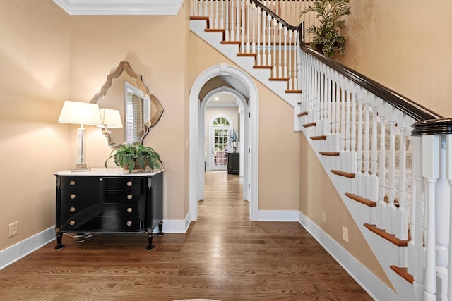 30 Woodburn St, Frankfort, KY 40601 - staircase with wood finished floors, arched walkways, and ornamental molding