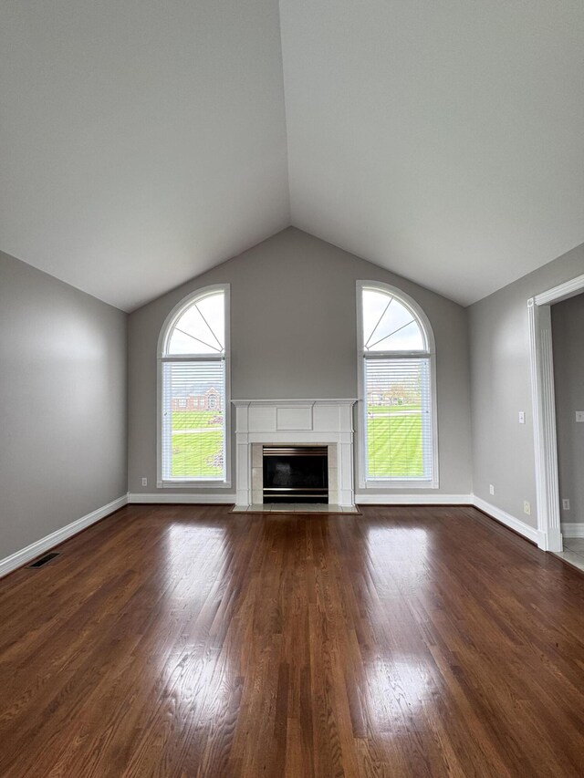 117 Richland Dr, Richmond, KY 40475 - unfurnished living room with lofted ceiling, a tile fireplace, and dark wood finished floors