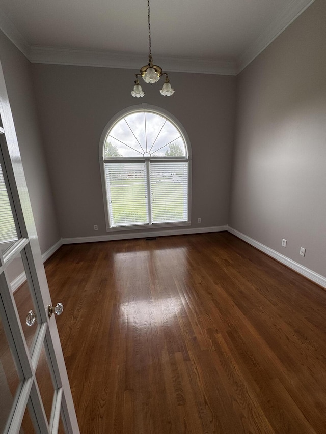 117 Richland Dr, Richmond, KY 40475 - spare room featuring a chandelier, dark wood-style flooring, and crown molding