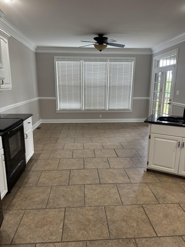 117 Richland Dr, Richmond, KY 40475 - kitchen with black / electric stove, ceiling fan, crown molding, brick patterned floors, and white cabinetry