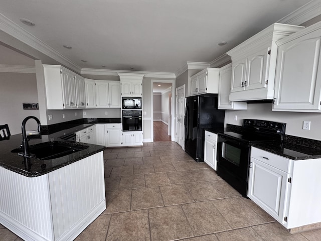 117 Richland Dr, Richmond, KY 40475 - kitchen with black appliances, a peninsula, white cabinetry, crown molding, and under cabinet range hood
