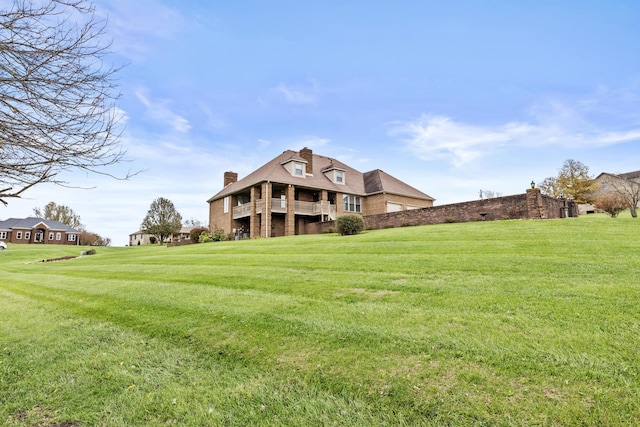 117 Richland Dr, Richmond, KY 40475 - rear view of property featuring a lawn and a chimney