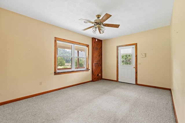 11238 Campton Rd, Stanton, KY 40380 - unfurnished room with plenty of natural light, light carpet, and a ceiling fan