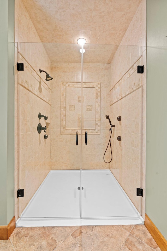 11238 Campton Rd, Stanton, KY 40380 - bathroom featuring a stall shower and baseboards