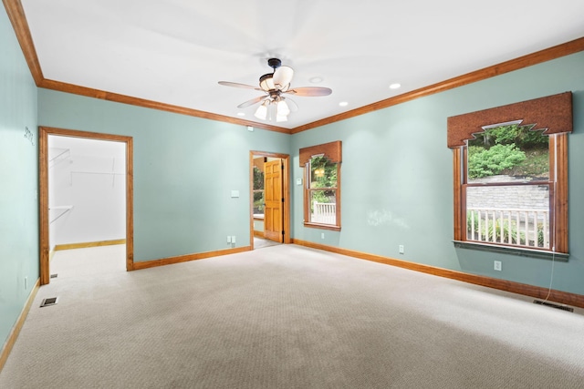 11238 Campton Rd, Stanton, KY 40380 - carpeted empty room featuring healthy amount of natural light, ornamental molding, ceiling fan, and recessed lighting