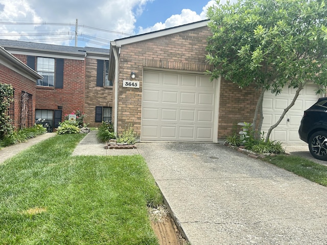 3645 Squire Woods Way, Lexington, KY 40515 - view of front of home with concrete driveway, brick siding, a garage, and a front yard