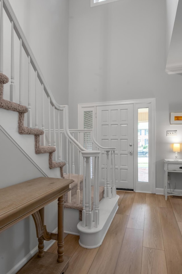 1074 Rockbridge Rd, Lexington, KY 40515 - foyer featuring a towering ceiling, light wood-type flooring, and stairway