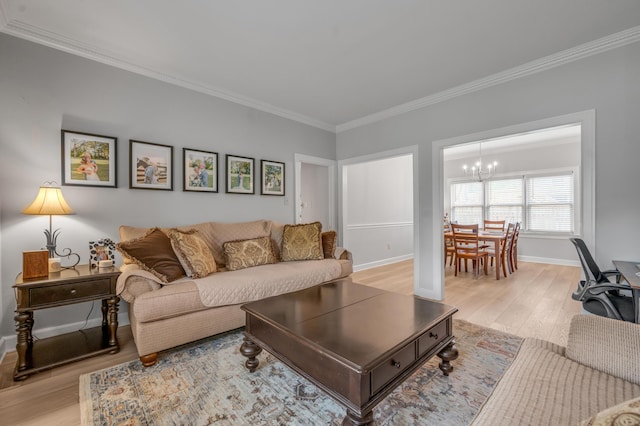 1074 Rockbridge Rd, Lexington, KY 40515 - living area featuring light wood-style floors, a chandelier, and ornamental molding