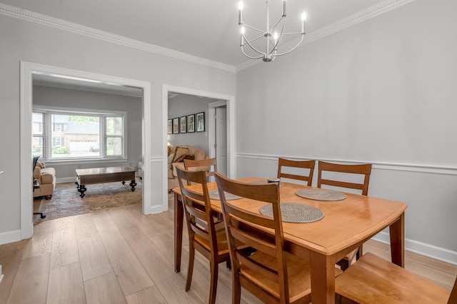 1074 Rockbridge Rd, Lexington, KY 40515 - dining space featuring ornamental molding, a chandelier, and light wood-type flooring