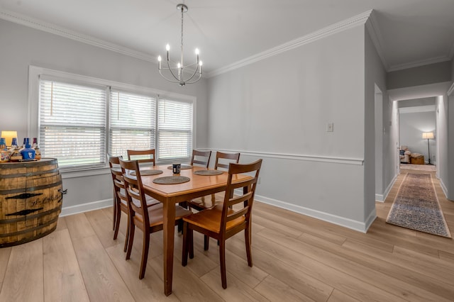 1074 Rockbridge Rd, Lexington, KY 40515 - dining space with a chandelier, crown molding, and light wood-style floors