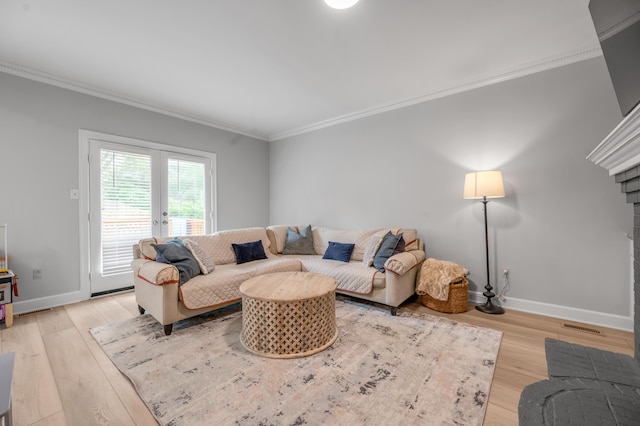 1074 Rockbridge Rd, Lexington, KY 40515 - living area featuring ornamental molding, french doors, light wood-style flooring, and a fireplace