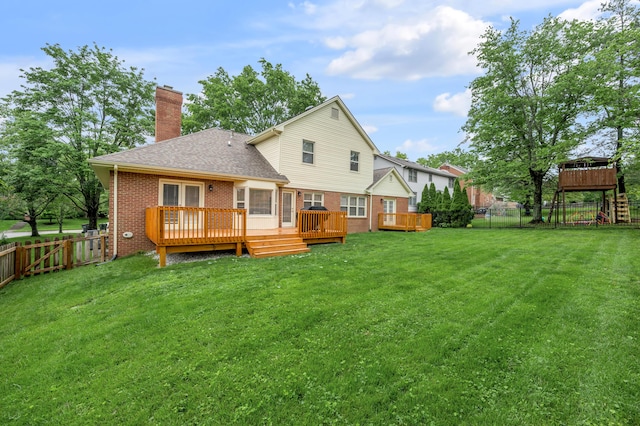 1074 Rockbridge Rd, Lexington, KY 40515 - back of house featuring brick siding, a fenced backyard, a chimney, and a wooden deck