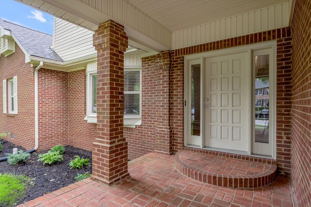 1074 Rockbridge Rd, Lexington, KY 40515 - doorway to property featuring brick siding and roof with shingles