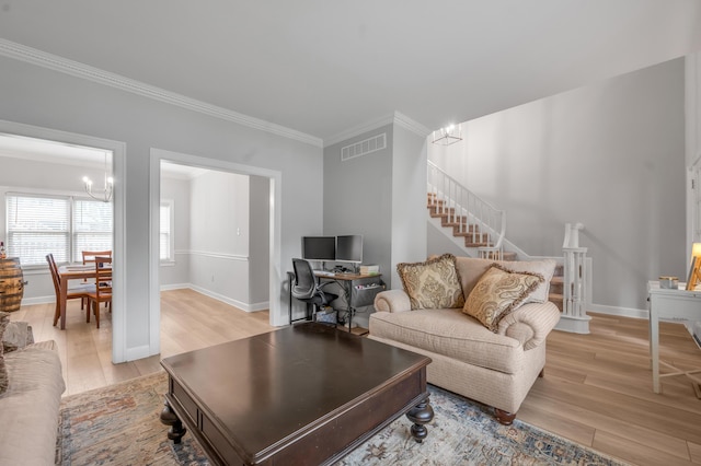 1074 Rockbridge Rd, Lexington, KY 40515 - living area with ornamental molding, light wood finished floors, stairway, a chandelier, and a desk