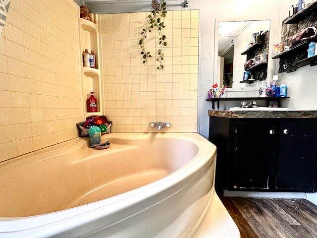 697 Ky 3439, Barbourville, KY 40906 - full bath featuring a garden tub, vanity, and wood finished floors