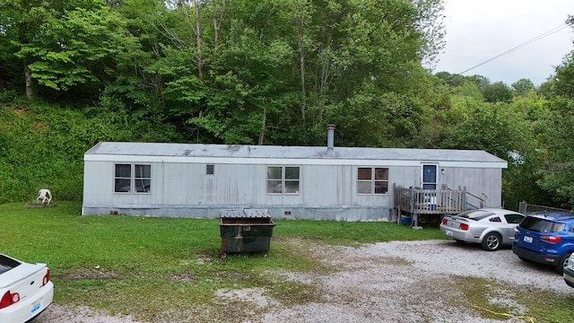 697 Ky 3439, Barbourville, KY 40906 - manufactured / mobile home with crawl space, a front lawn, and a wooded view