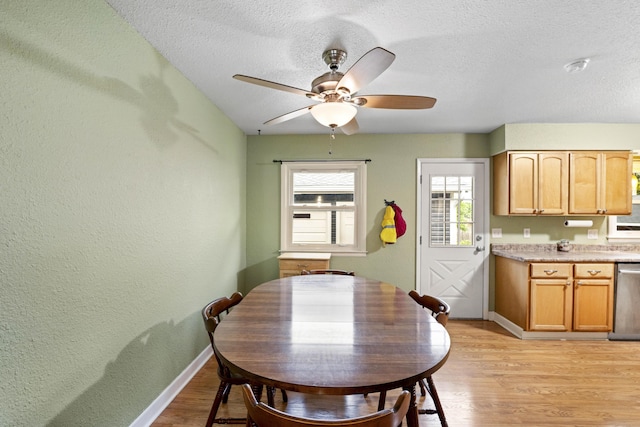 3523 Brookview Dr, Lexington, KY 40517 - dining area featuring ceiling fan, light wood-style floors, a textured ceiling, and a textured wall