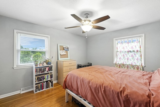 3523 Brookview Dr, Lexington, KY 40517 - bedroom with wood finished floors and a ceiling fan